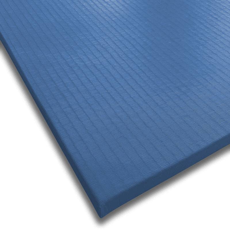 Nahaufnahme der blauen Tatami Judomatte mit strukturierter Oberfläche. Ideal für Judo, Karate und andere Kampfsportarten.