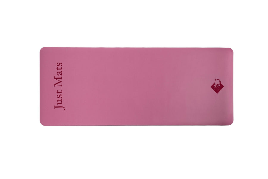 Rosa Yogamatte PUREFLOW PRO aus Naturkautschuk und PU-Leder mit kratzfester Oberfläche und optimalem Grip.