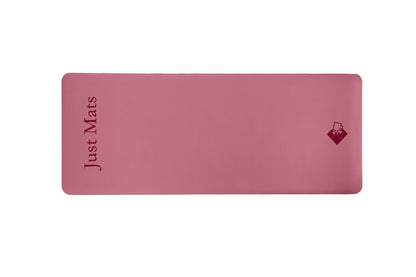 Rosa Yogamatte PUREFLOW PRO aus Naturkautschuk und PU-Leder mit kratzfester Oberfläche für optimalen Grip.