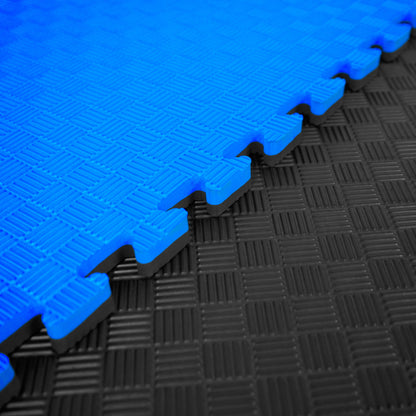 Kampfsport Puzzlematte 100 x 100 cm in Blau und Schwarz mit rutschfester Oberfläche, ideal als Bodenschutzmatte für Fitness und Gymnastik.