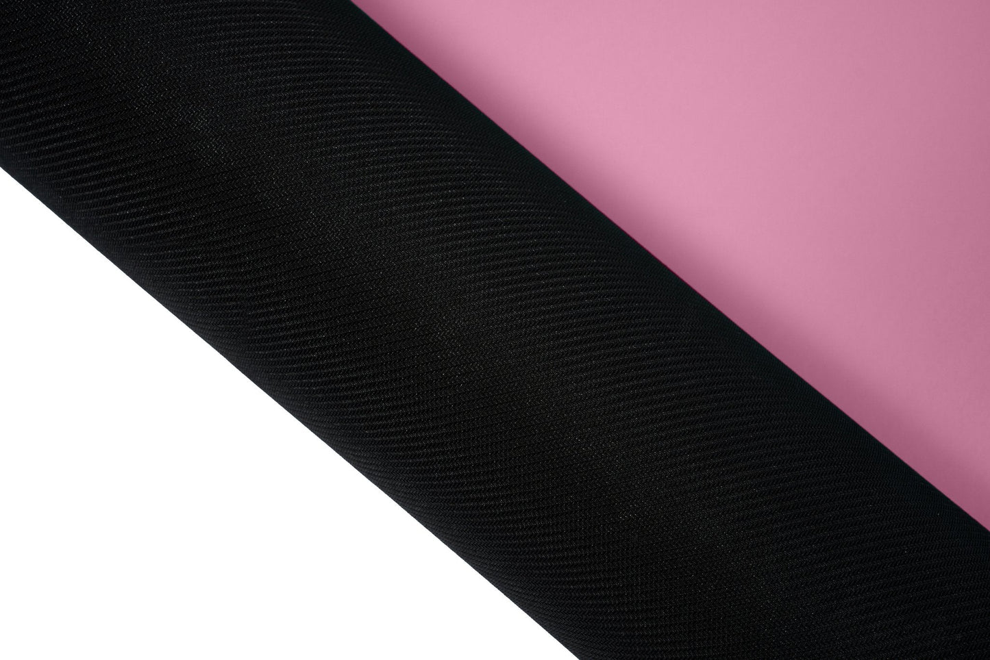Yogamatte PUREFLOW PRO aus Naturkautschuk und PU-Leder in Schwarz und Rosa mit rutschfester Struktur für optimalen Grip.