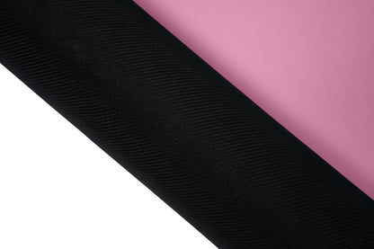 Yogamatte PUREFLOW PRO aus Naturkautschuk und PU-Leder in Schwarz und Rosa mit rutschfester Struktur für optimalen Grip.