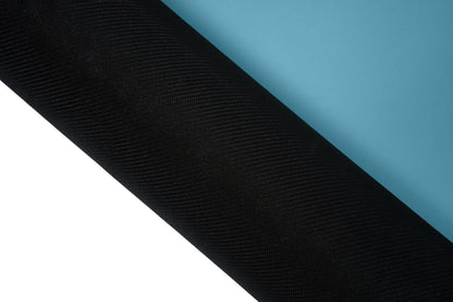 Minimalistische Yogamatte PUREFLOW PRO aus Naturkautschuk und kratzfestem PU-Leder in Schwarz mit rutschfester Struktur.