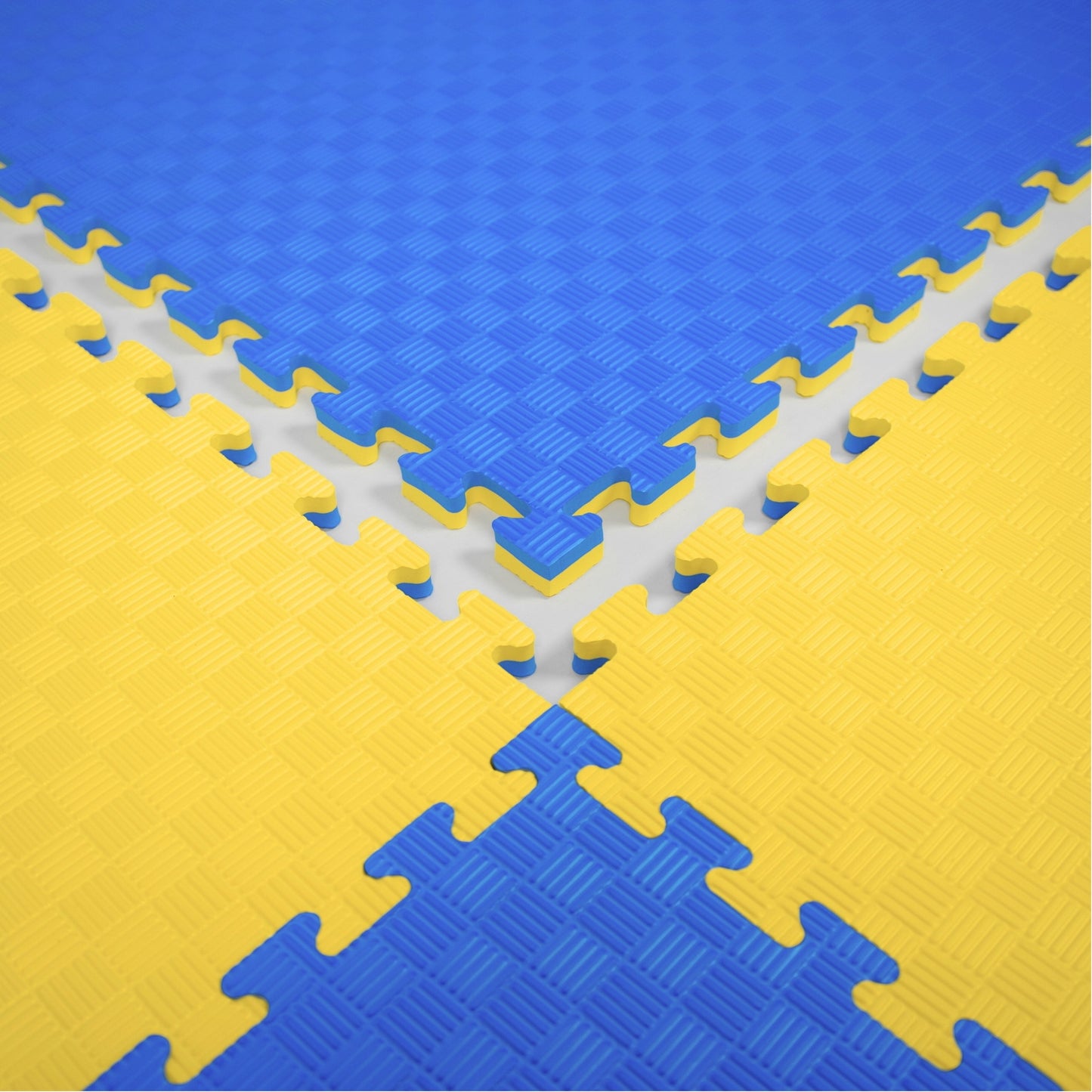 Kampfsport Puzzlematte 100 x 100 cm in Blau und Gelb mit rutschfester Oberfläche. Ideal für Fitness, Yoga und Gymnastik, online kaufen.