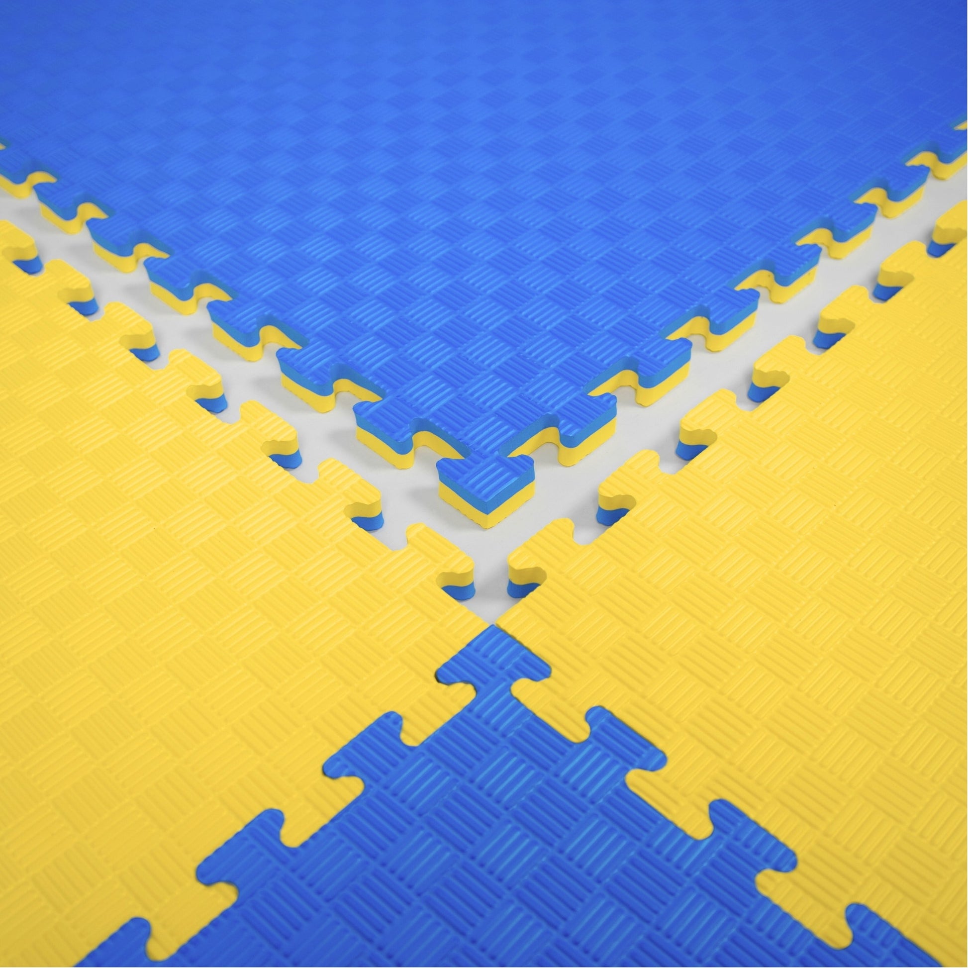 Kampfsport Puzzlematte 100 x 100 cm in Blau und Gelb mit rutschfester Oberfläche. Ideal für Fitness, Yoga und Gymnastik, online kaufen.