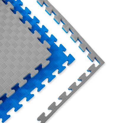 Kampfsport Puzzlematte 100 x 100 cm in Grau und Blau mit Verzahnung, ideal als Bodenschutzmatte für Fitness und Gymnastik. Rutschfest und pflegeleicht online kaufen.